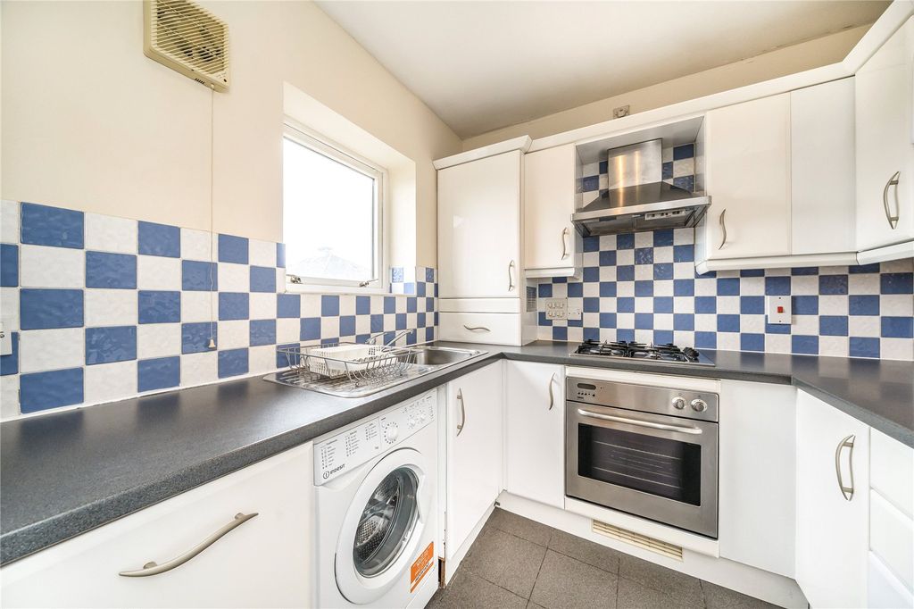 Property photo 3 of 7 Kitchen