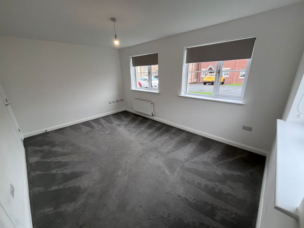 Property photo 2 of 12 Living Room