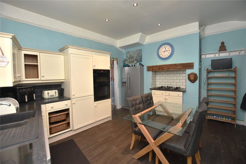 Property photo 3 of 17 Dining Kitchen