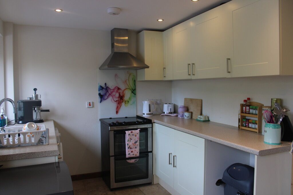 Property photo 3 of 8 Kitchen