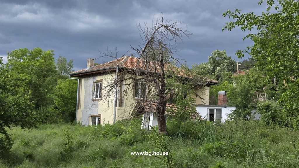 Property photo 1 of 29 Exterior View Of A Two-Storey Yellow House With A Tiled Roof And Surrounding Greenery In Koprivets Village.