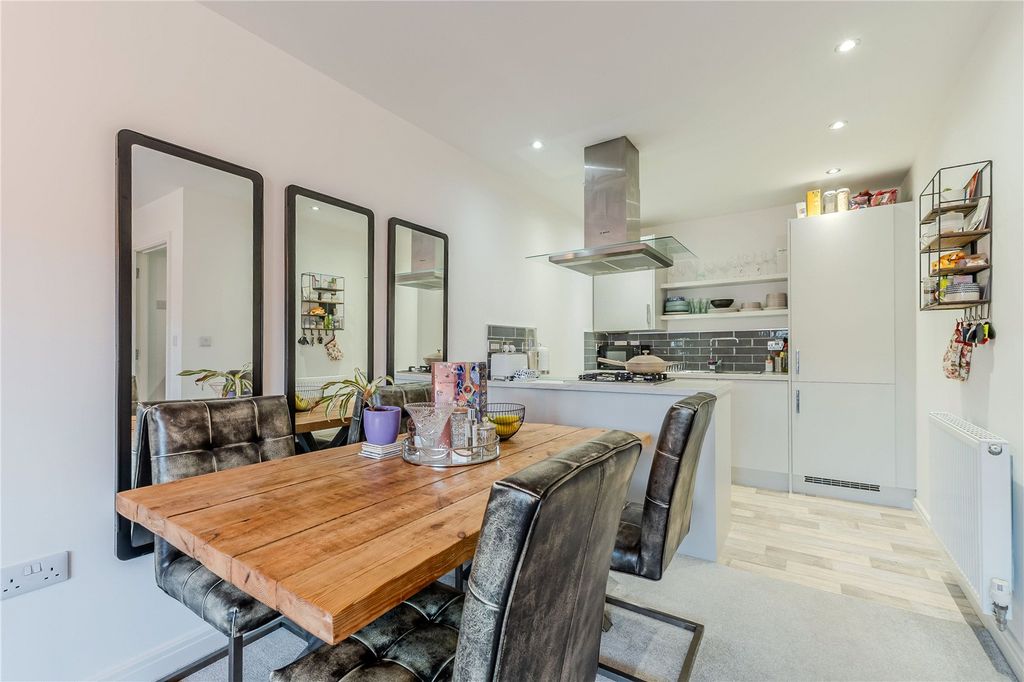 Property photo 3 of 12 Dining Kitchen