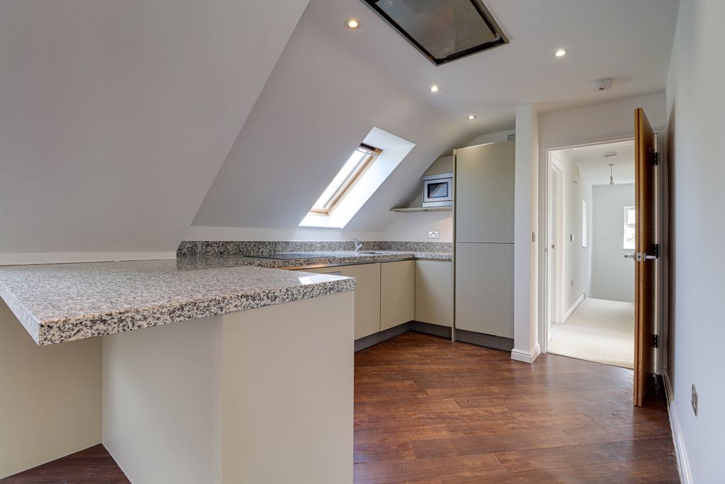 Property photo 3 of 12 Kitchen Area