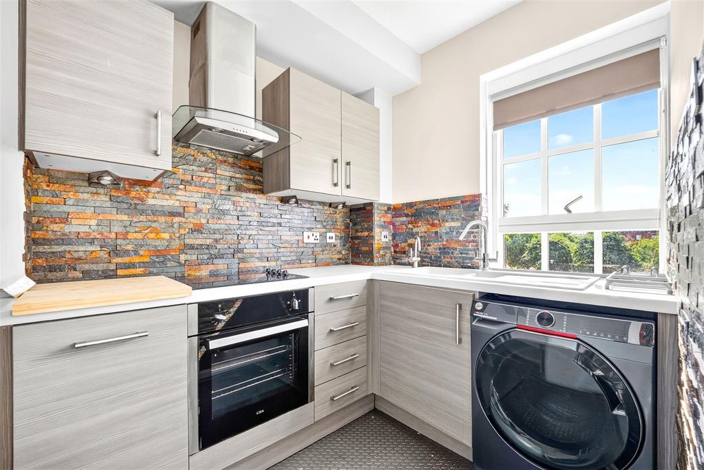 Property photo 3 of 13 Kitchen