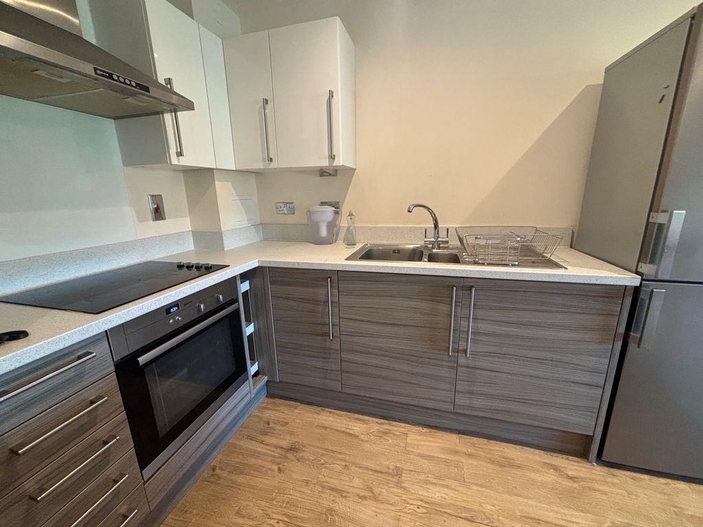 Property photo 3 of 7 Kitchen