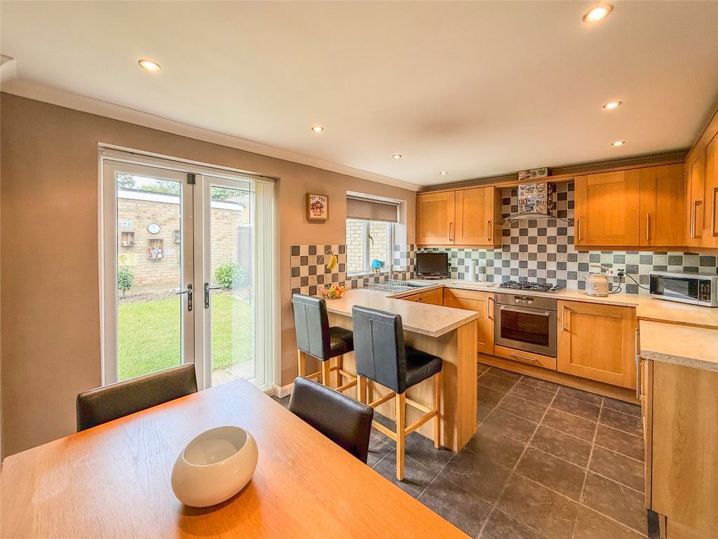 Property photo 3 of 14 Dining Kitchen