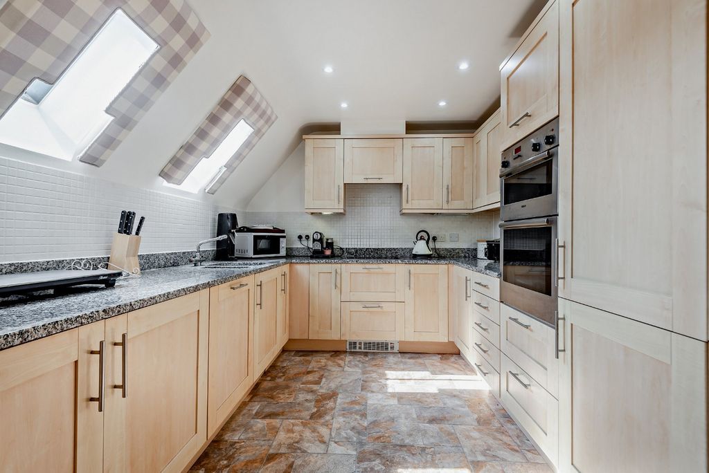 Property photo 3 of 12 Kitchen