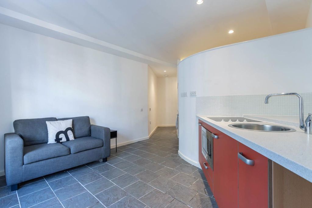 Property photo 2 of 13 Living Area