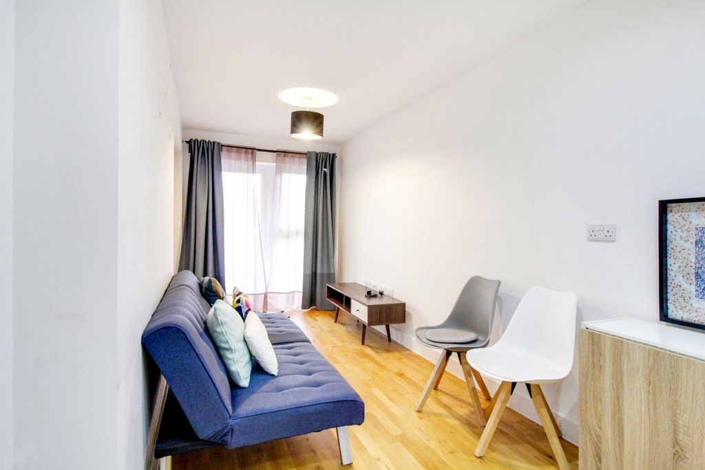 Property photo 3 of 12 Living Room