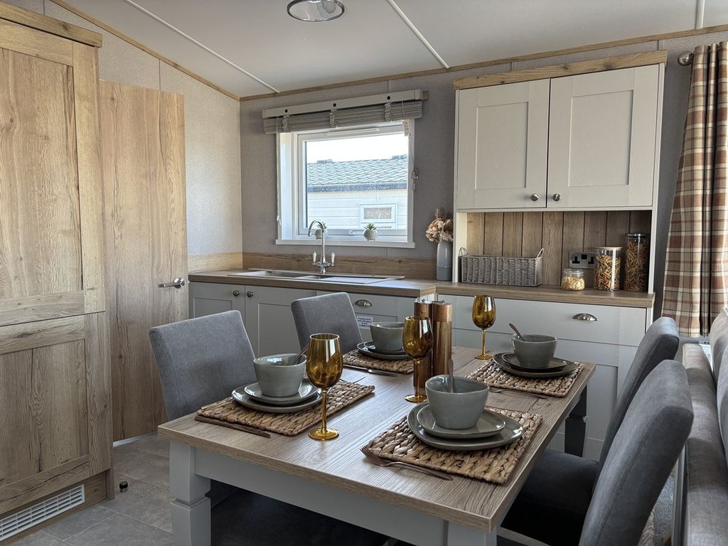 Property photo 2 of 7 78 Lounge Dining Area