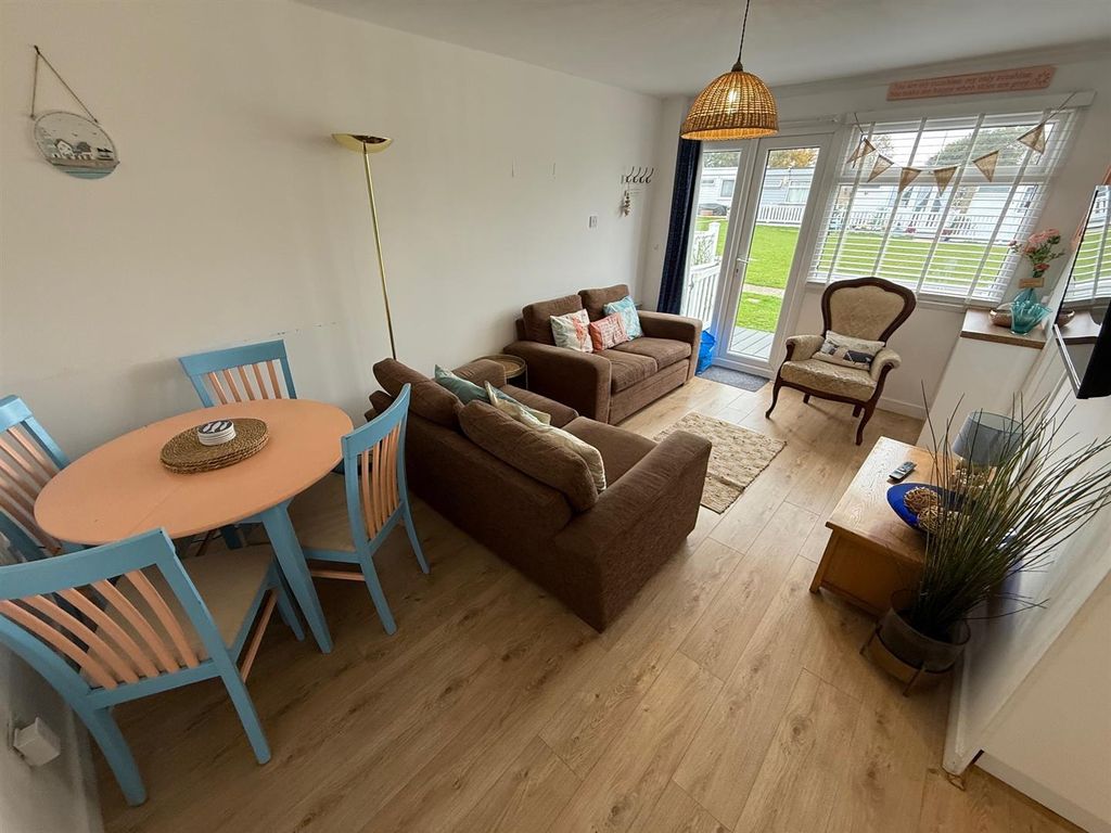 Property photo 3 of 8 Living Area