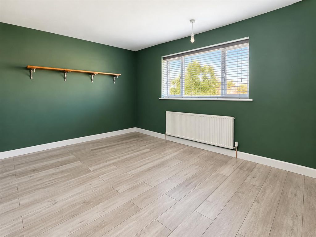Property photo 1 of 18 Empty Green Room With Window And Shelf.Png