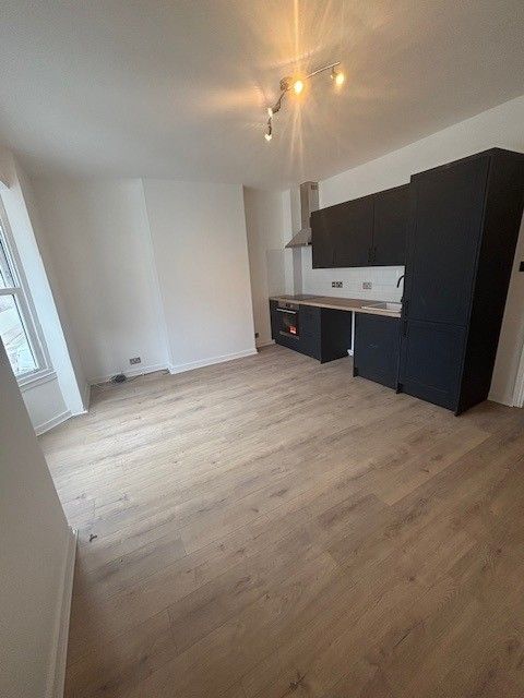 Property photo 2 of 11 Kitchen And Open Plan Living Area 