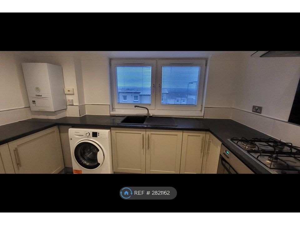 Property photo 3 of 13 Kitchen