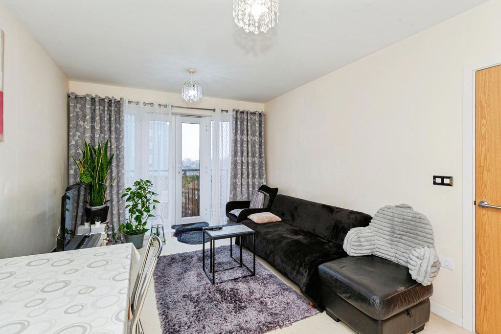 Property photo 3 of 12 Living Room