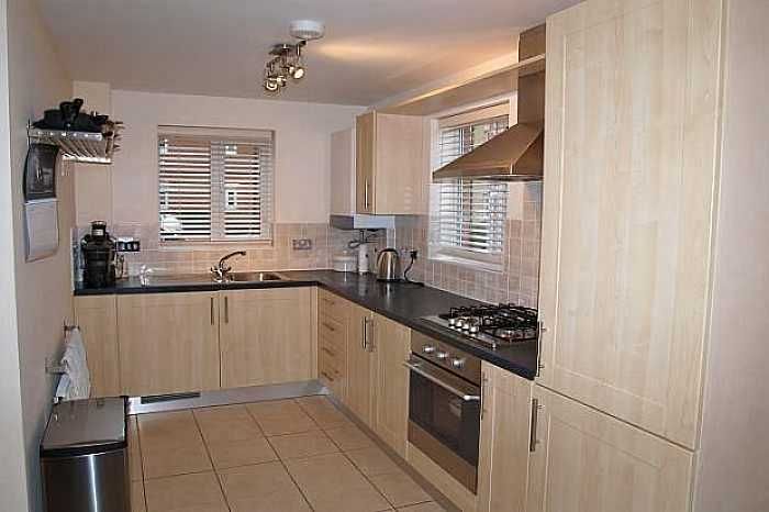 Property photo 2 of 8 Kitchen