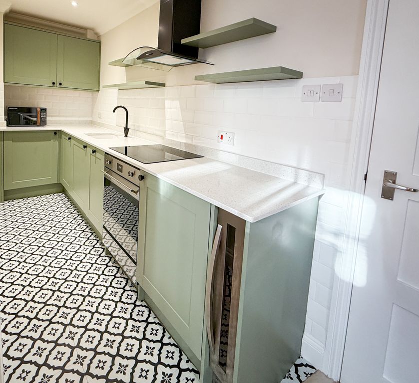 Property photo 3 of 12 Kitchen