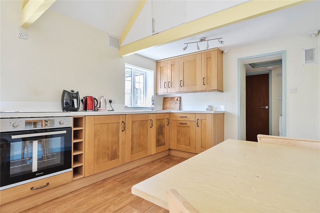Property photo 3 of 12 Kitchen