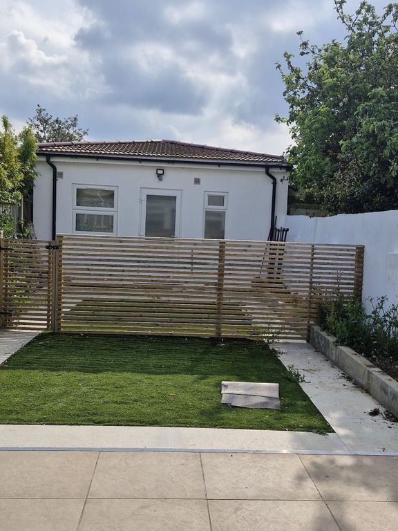 Property photo 1 of 14 Private Outdoor Garden With Lush Green Lawn...