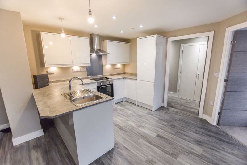 Property photo 3 of 14 Kitchen Area