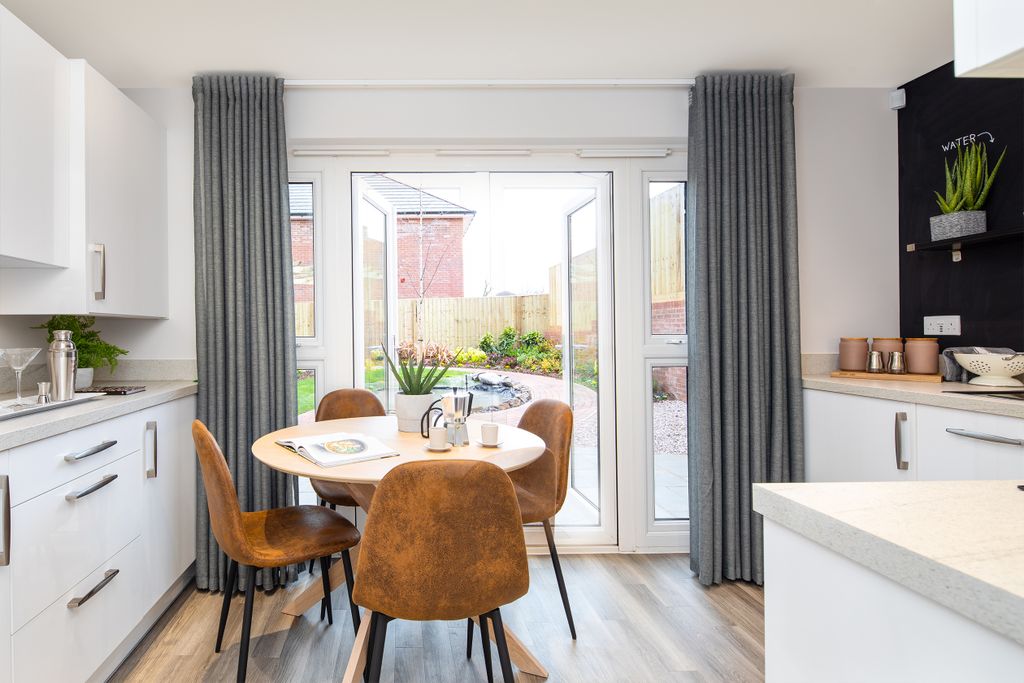 Property photo 3 of 9 Kitchen With Dining Area And French Doors In The Kenley 2 Bedroom Home