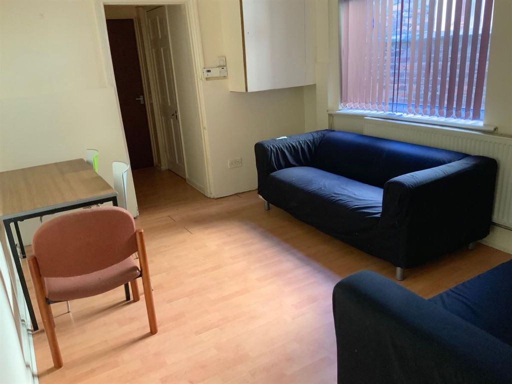 Property photo 2 of 8 A Bright, Well-Maintained Living Room Featuring A ...