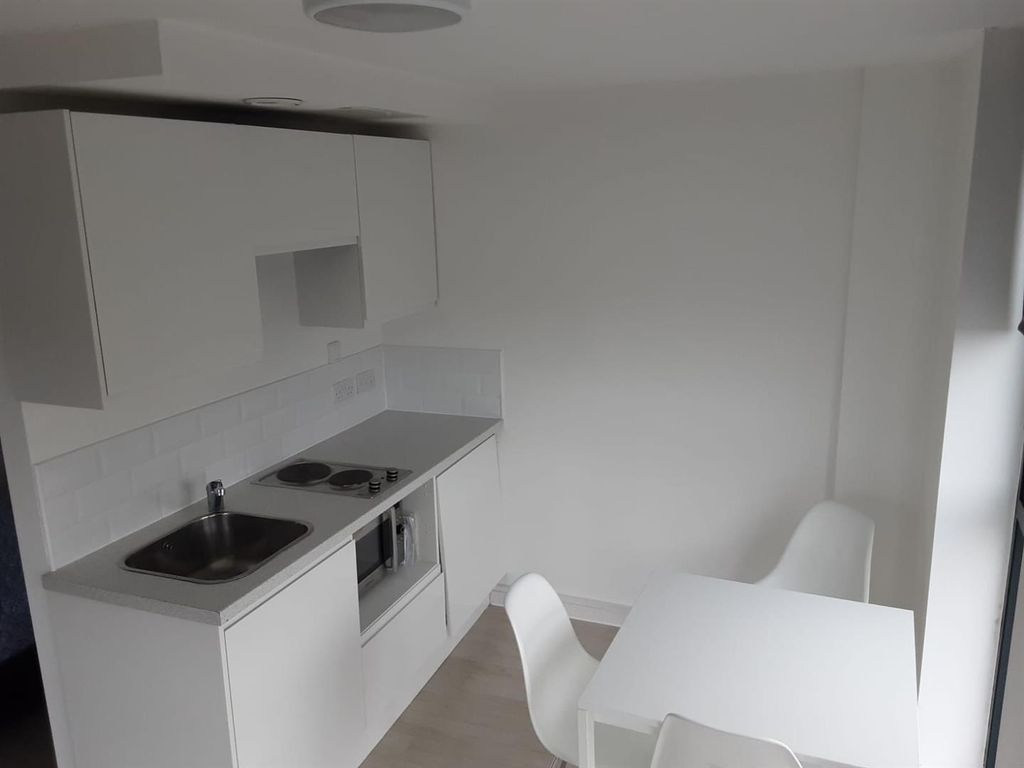 Property photo 2 of 8 Kitchen &amp; Dining