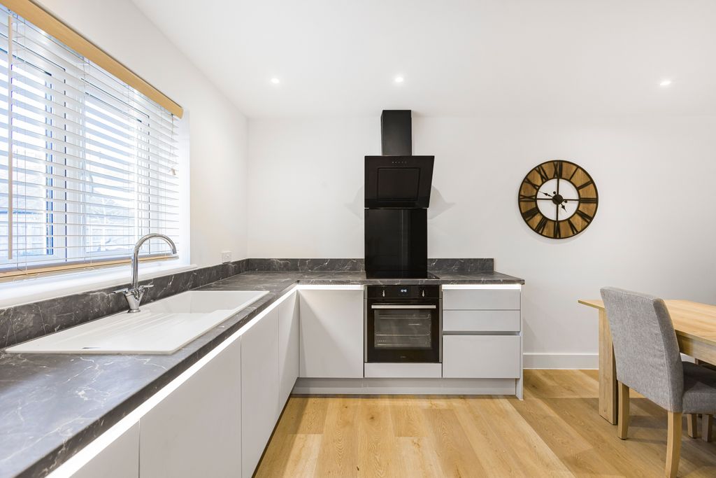 Property photo 3 of 12 Kitchen/Dining/Living Room