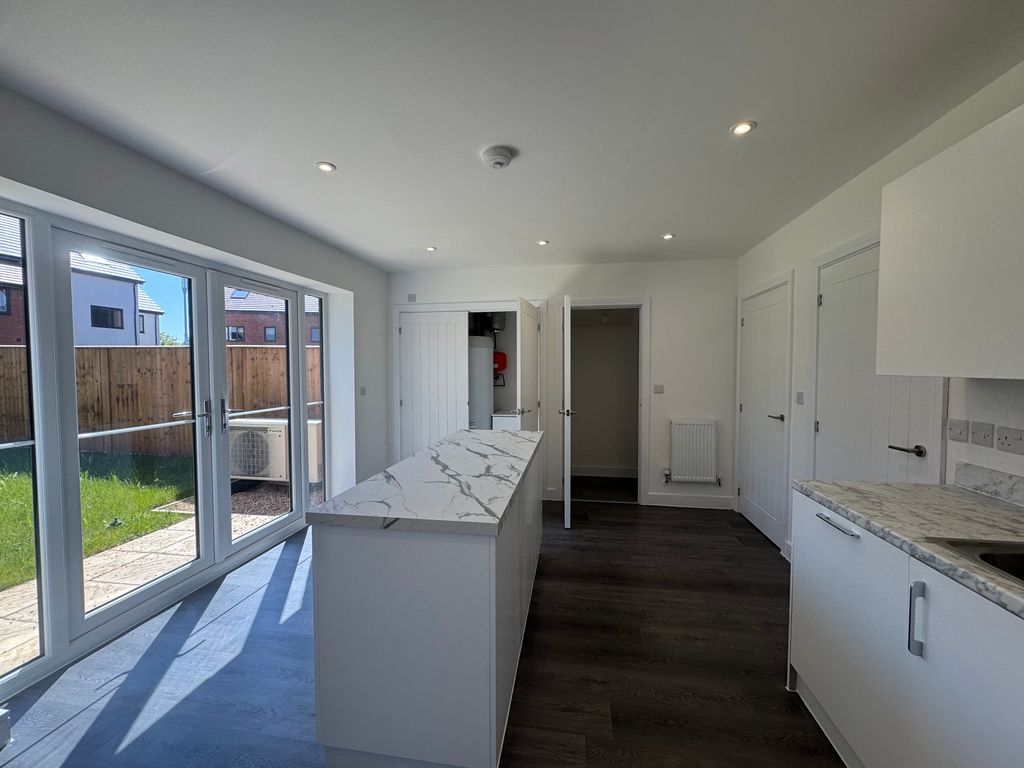 Property photo 2 of 12 Kitchen