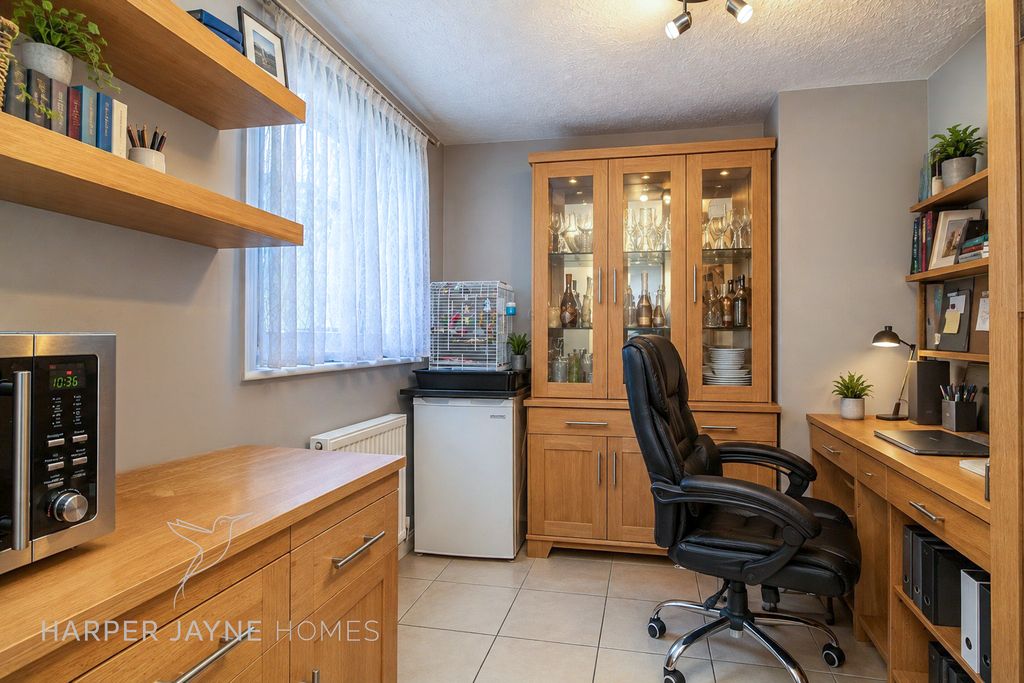Property photo 3 of 10 Organised Oak Home Office With Warm Lighting
