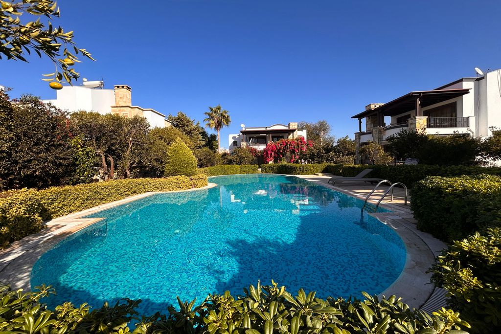 Property photo 2 of 23 Tranquil Two-Bedroom Apartment In Bodrum For Sale - An Enticing Communal Pool