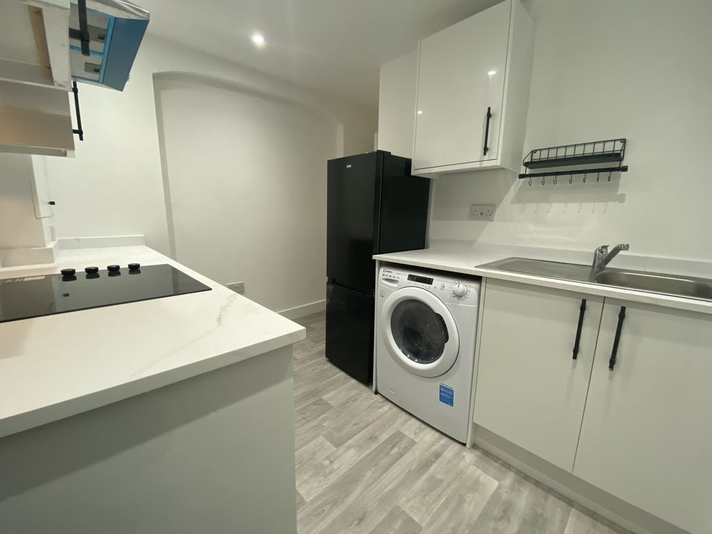 Property photo 3 of 12 Kitchen-B