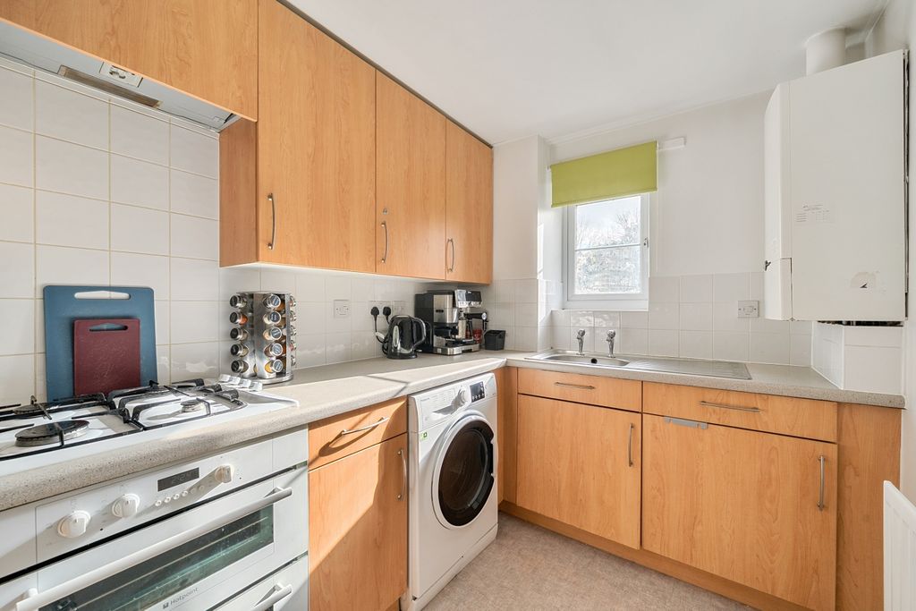 Property photo 3 of 16 Kitchen