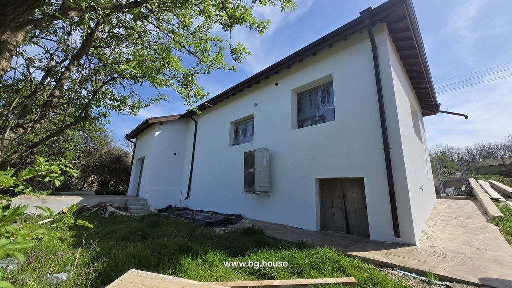 Property photo 1 of 82 View Of The White Renovated House Exterior Showing New Windows And An Air Conditioning Unit Mounted On The Wall