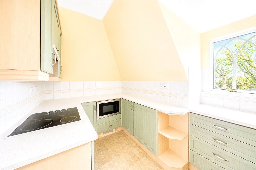 Property photo 3 of 12 Kitchen