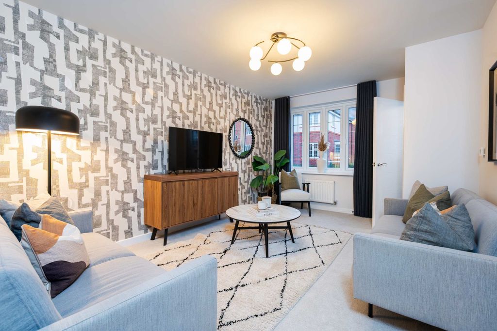 Property photo 3 of 10 Two Light Gray Sofas Face A Wooden Media Console With A Television And A Patterned Rug In The Foregr