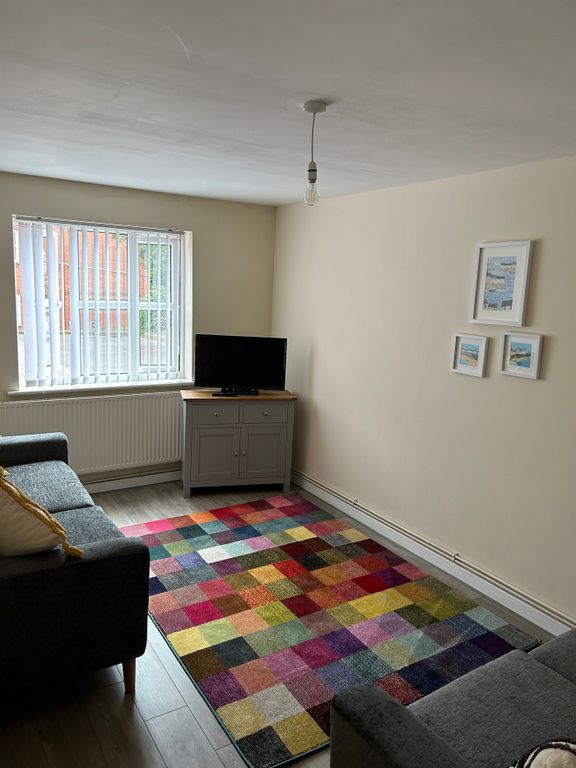 Property photo 1 of 13 A Spacious And Inviting Large Modern Living Room W...