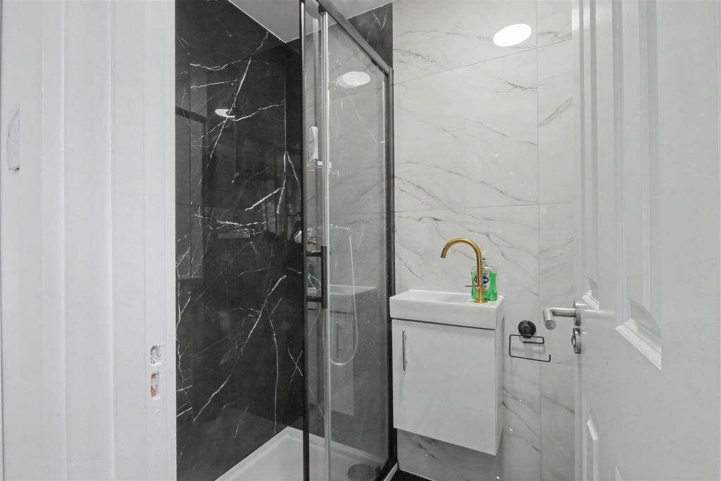 Property photo 3 of 9 Downstairs Bathroom