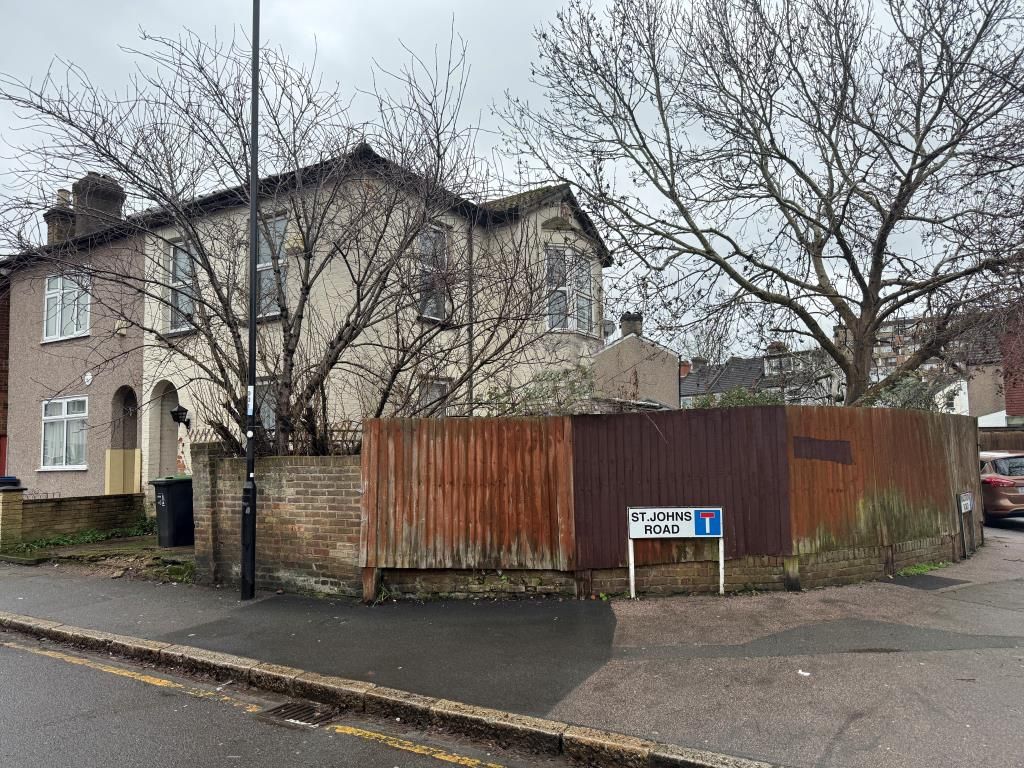 Property photo 1 of 9 View Of Front And Side Of House From Road