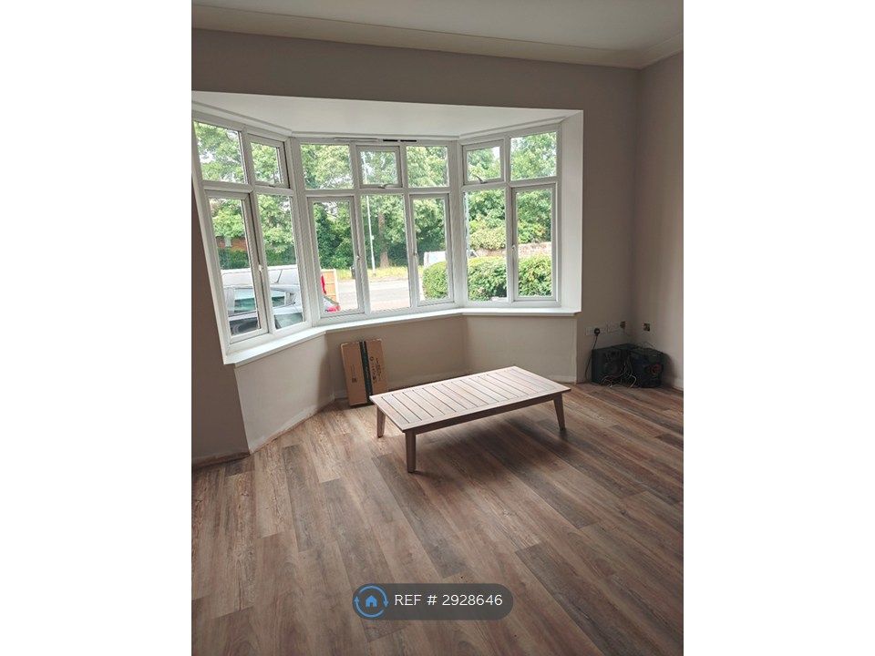 Property photo 2 of 13 Front Living Room