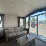 Property photo 2 of 4 Bright Lounge With Sofa And Large Patio Doors