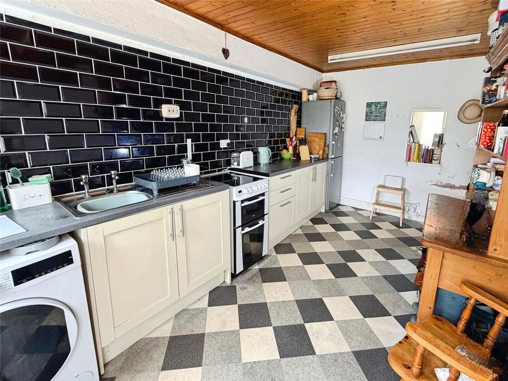 Property photo 3 of 13 Breakfast Kitchen