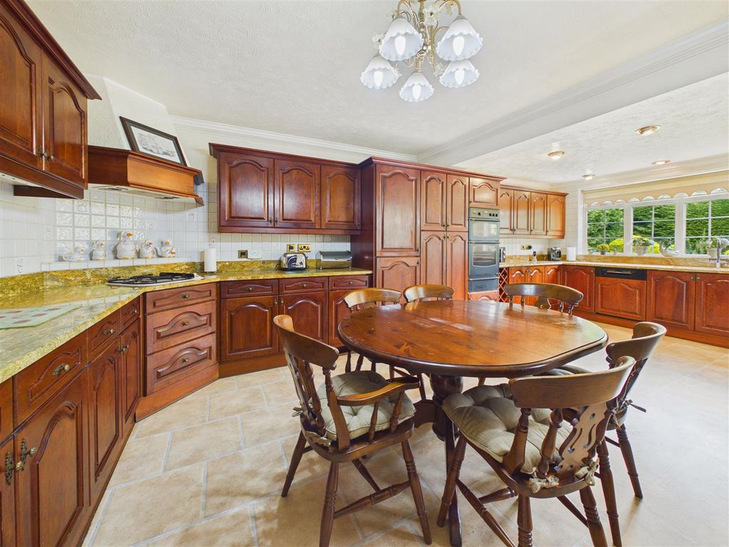 Property photo 3 of 13 Dining Kitchen