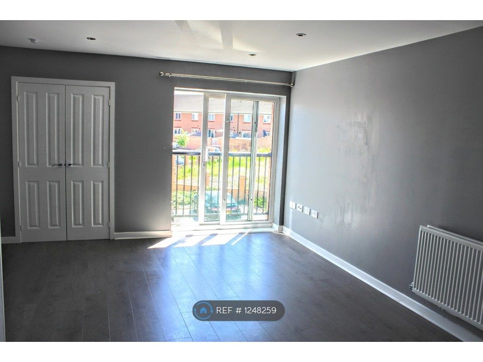 Property photo 3 of 11 Living Area With Patio Doors