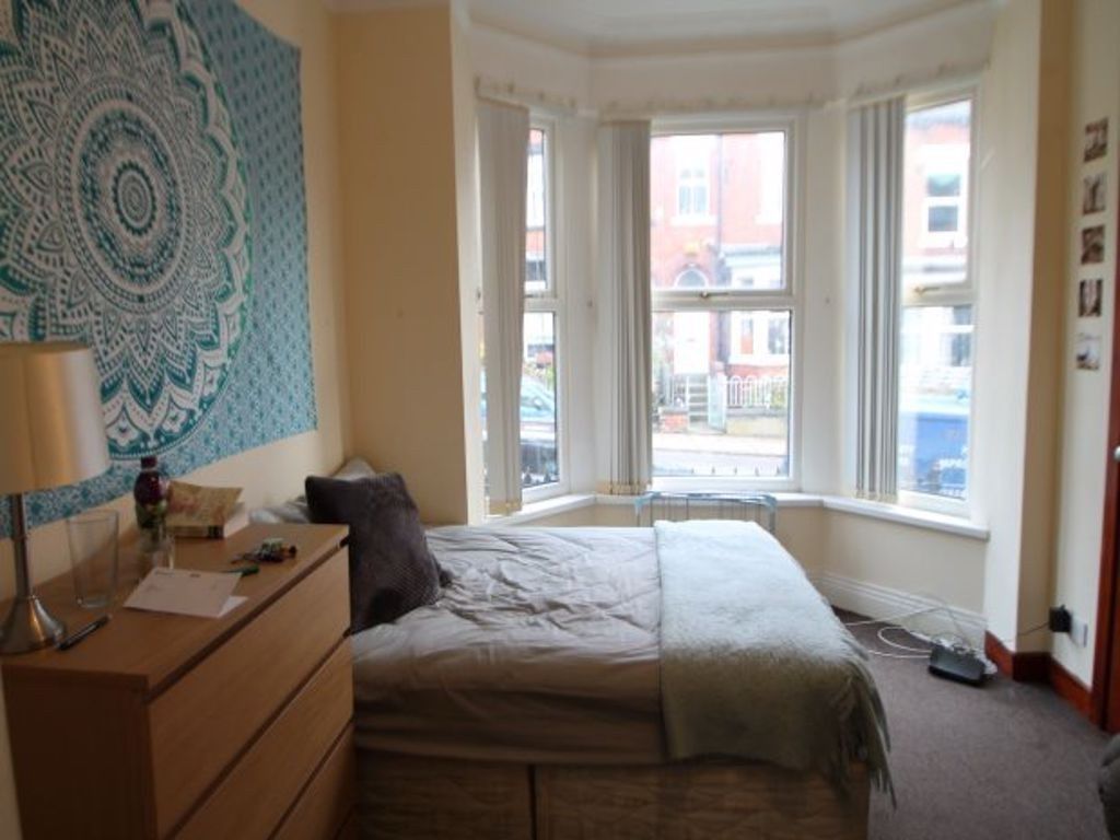 Property photo 1 of 23 A Spacious And Well-Lit Master Bedroom Featuring A...