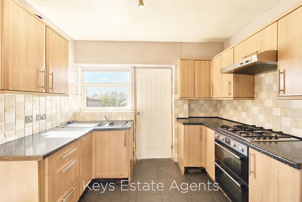 Property photo 1 of 12 Kitchen