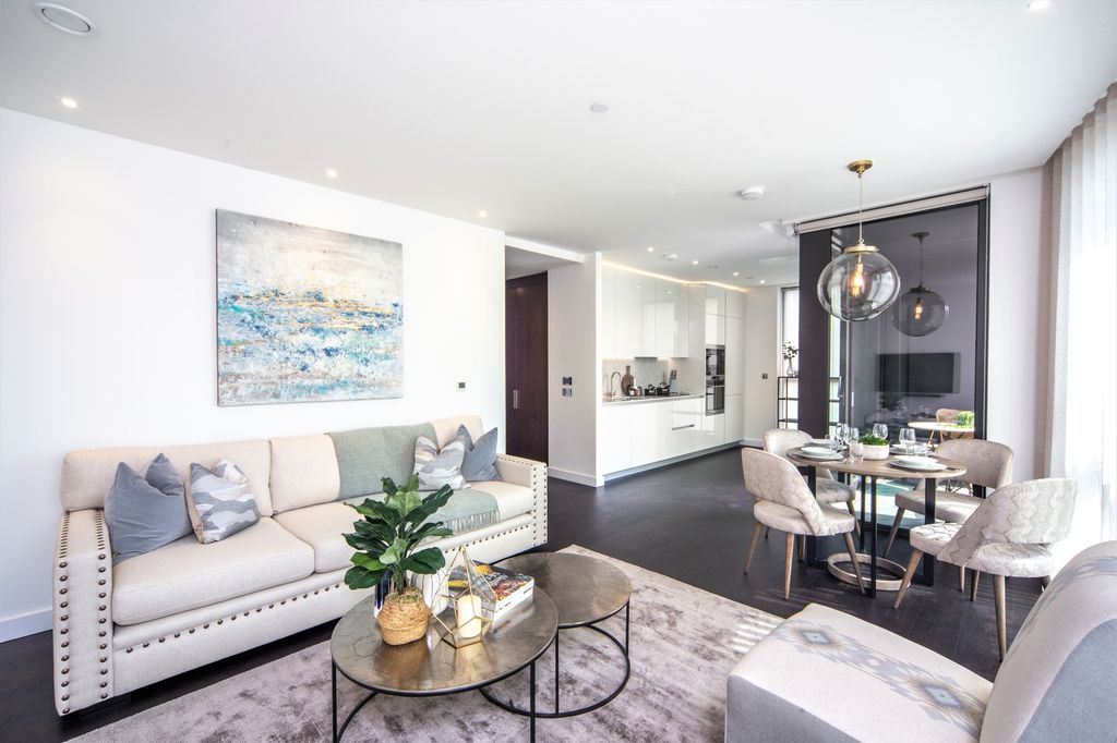 Property photo 1 of 11 This Spacious Living Room Features Contemporary Dã©...
