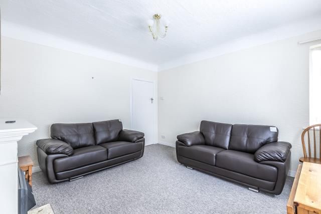 Property photo 3 of 10 Living Area
