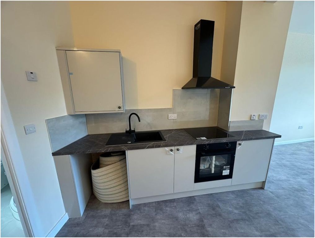 Property photo 1 of 8 Kitchen