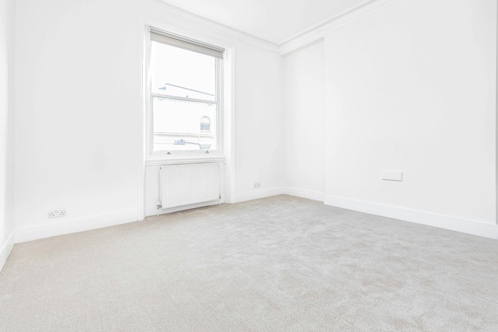 Property photo 2 of 11 Living Area